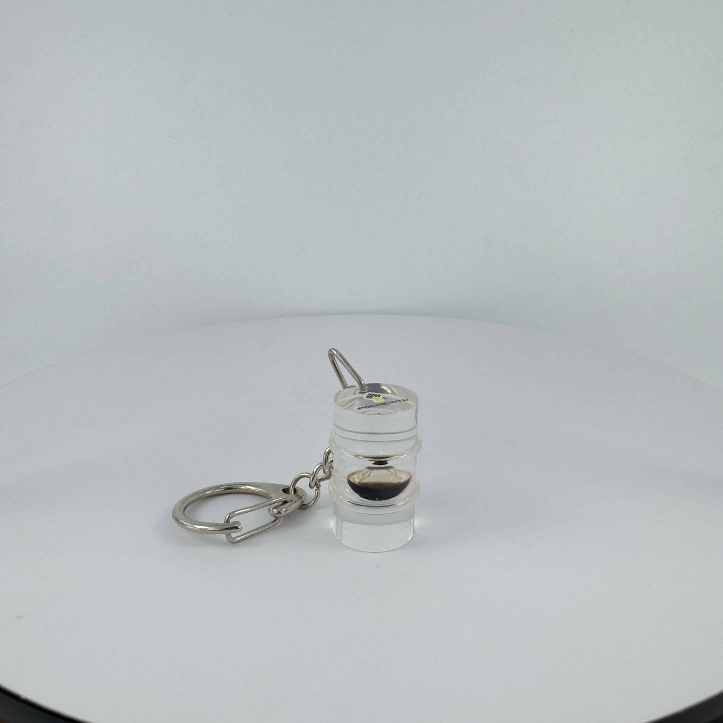 TRANSPARENT KEY CHAIN ENCAPSULATED WITH TEAR DROP OIL BOTTLE