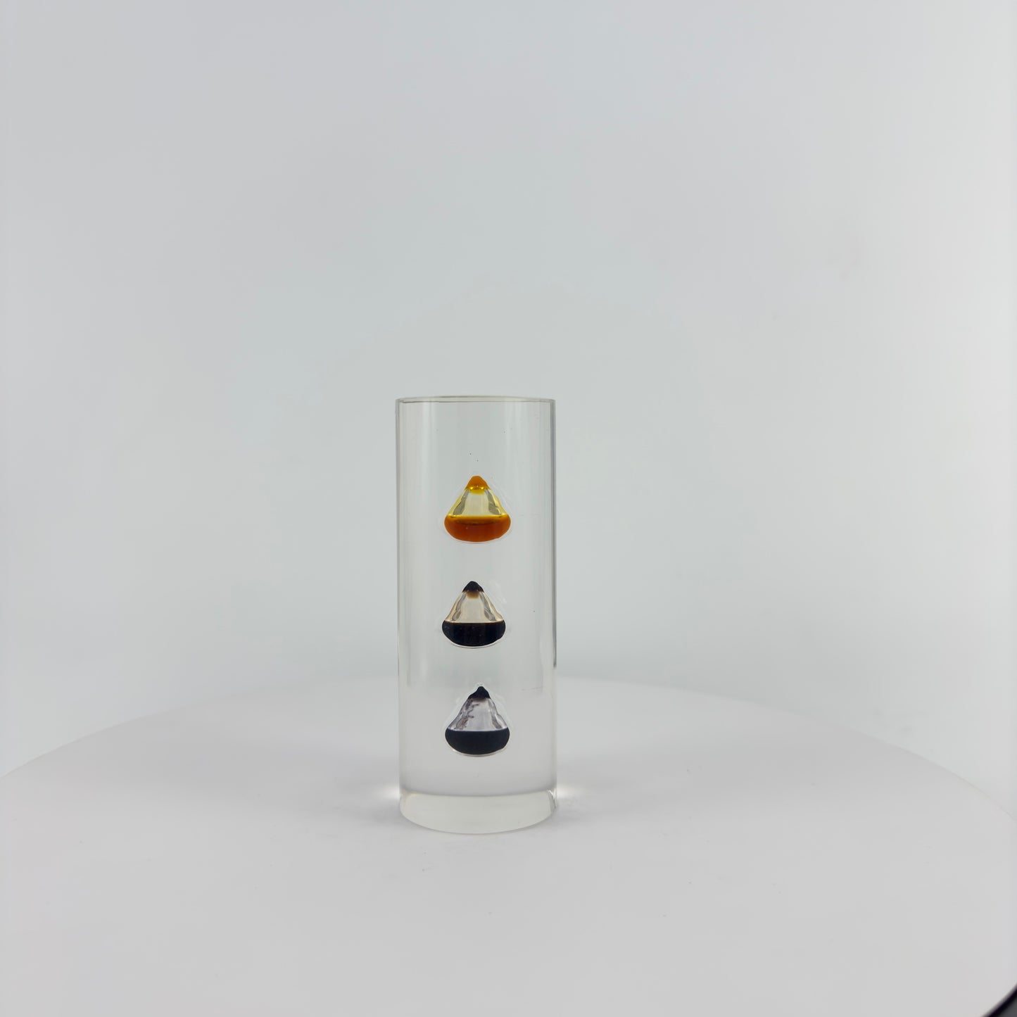 TRANSPARENT PAPER WEIGHT ENCAPSULATED WITH TEAR DROP OIL BOTTLE