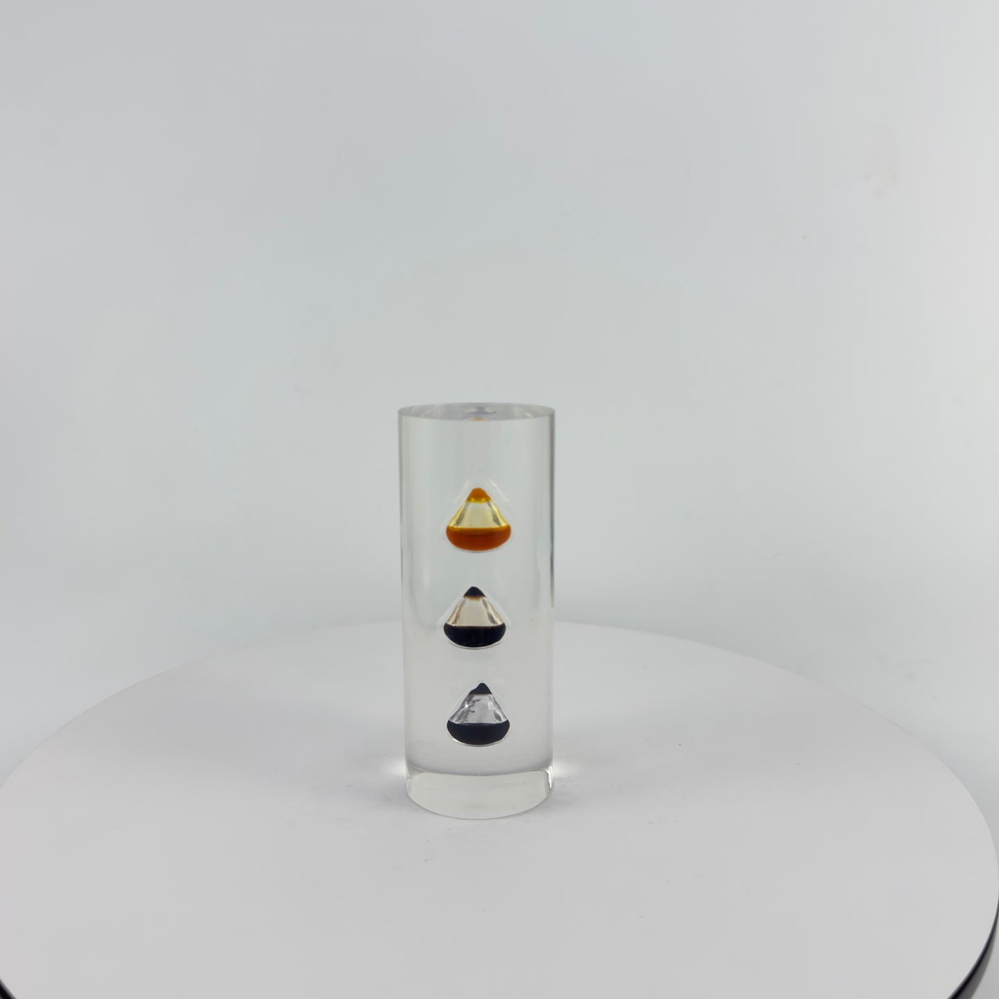 TRANSPARENT PAPER WEIGHT ENCAPSULATED WITH TEAR DROP OIL BOTTLE