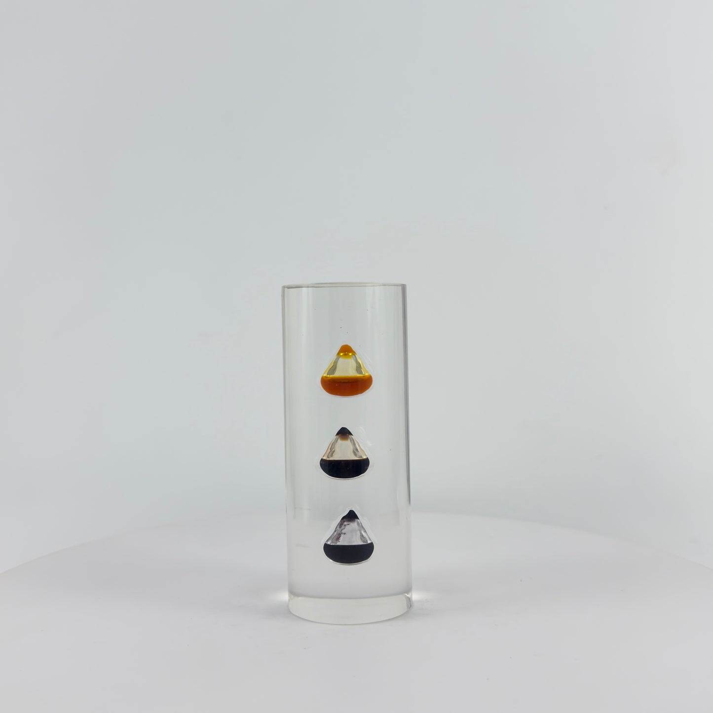TRANSPARENT PAPER WEIGHT ENCAPSULATED WITH TEAR DROP OIL BOTTLE