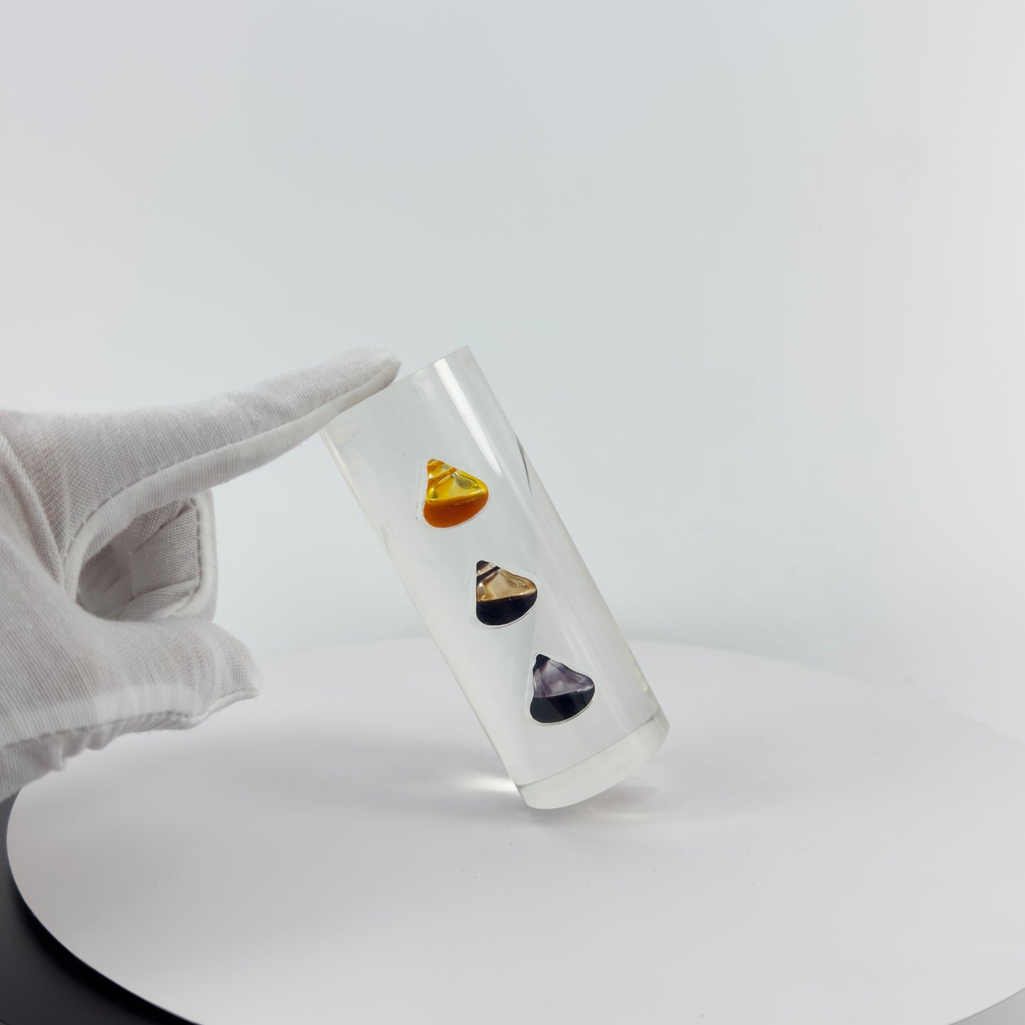 TRANSPARENT PAPER WEIGHT ENCAPSULATED WITH TEAR DROP OIL BOTTLE