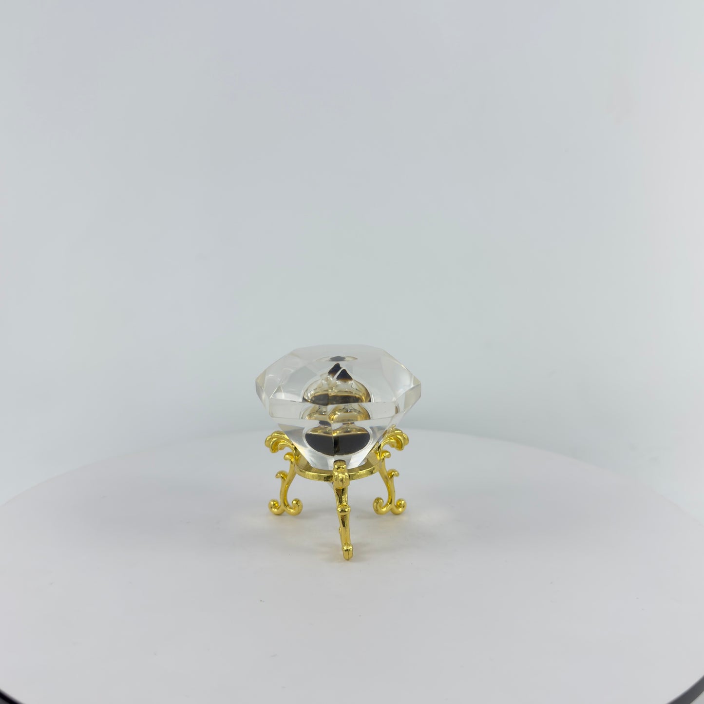 DIAMOND TRANSPARENT PAPER WEIGHT ENCAPSULATED WITH TEAR DROP OIL BOTTLE
