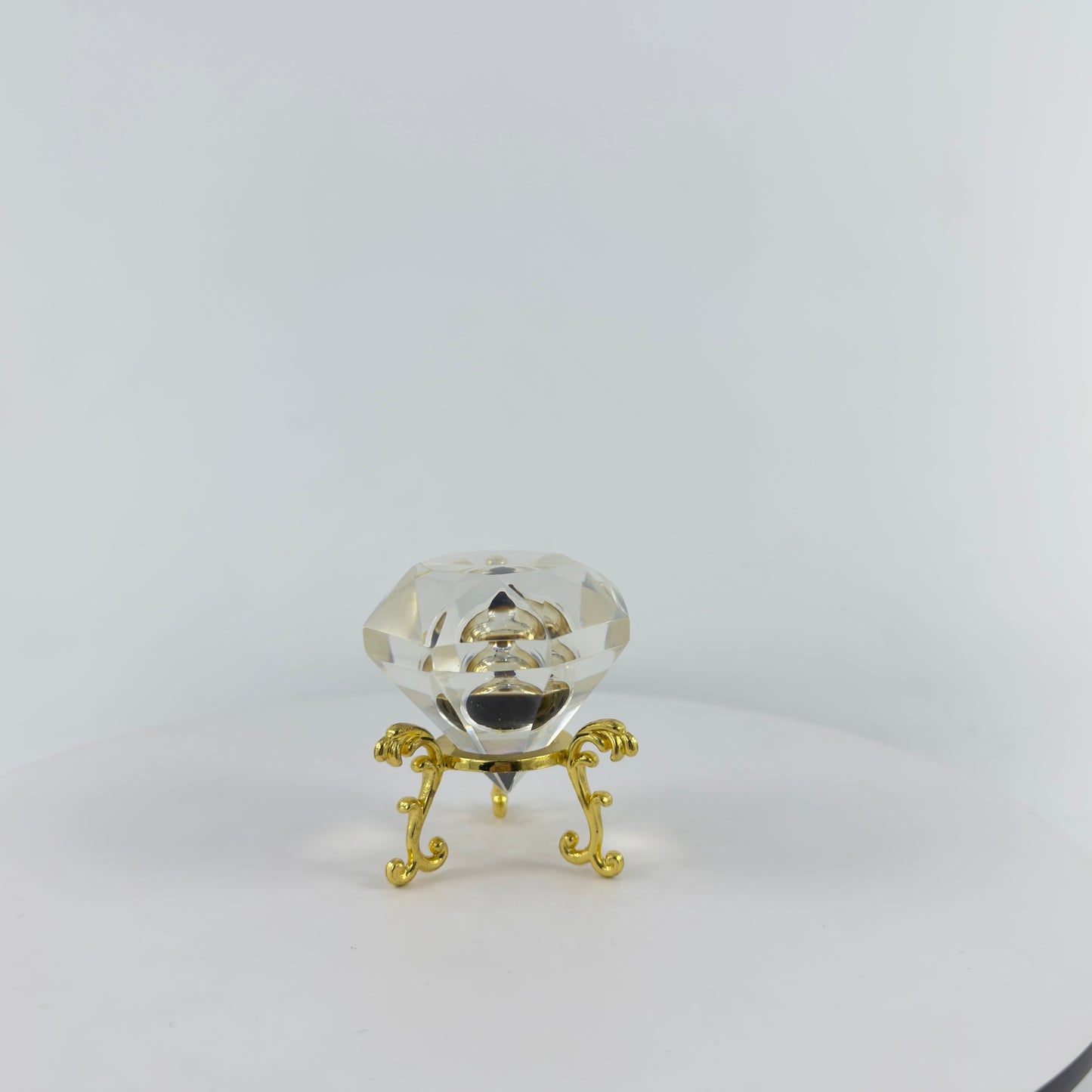 DIAMOND TRANSPARENT PAPER WEIGHT ENCAPSULATED WITH TEAR DROP OIL BOTTLE