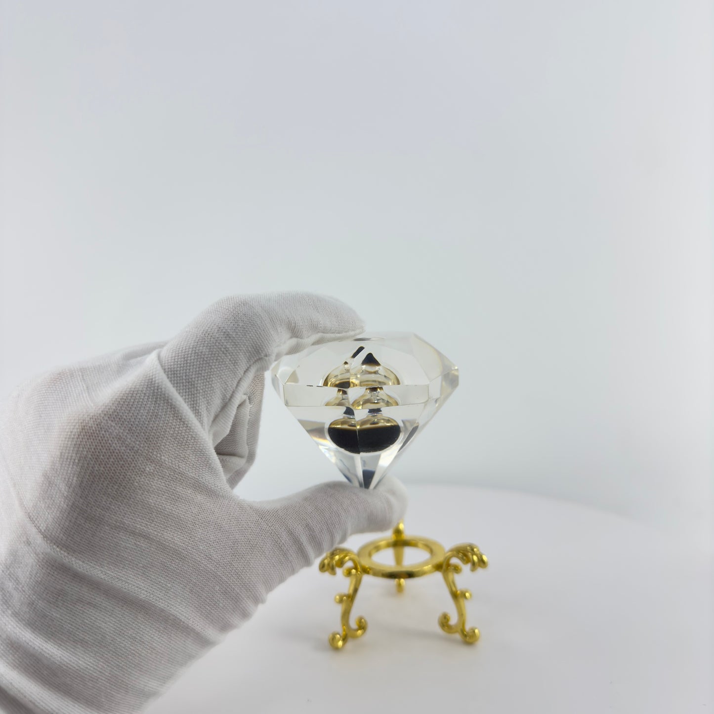 DIAMOND TRANSPARENT PAPER WEIGHT ENCAPSULATED WITH TEAR DROP OIL BOTTLE