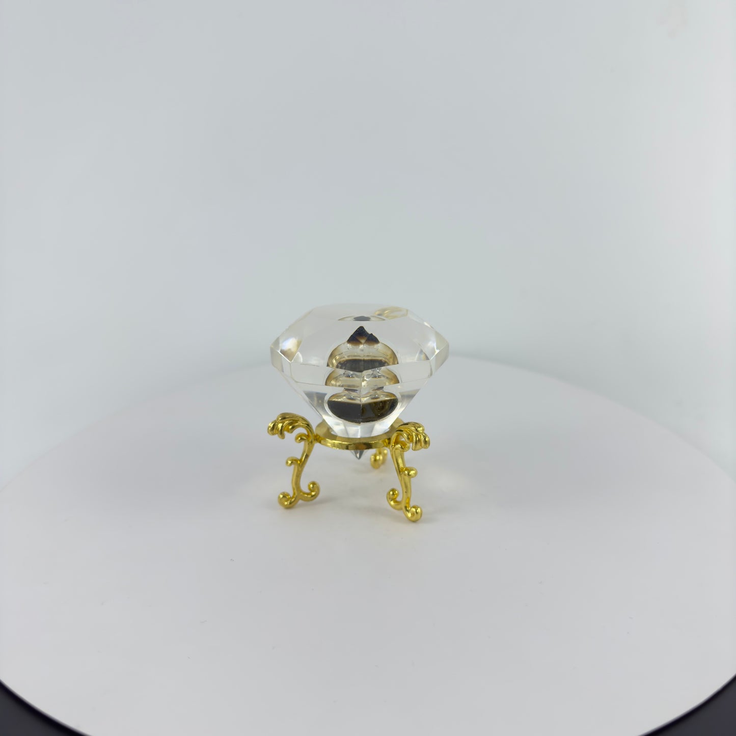 DIAMOND TRANSPARENT PAPER WEIGHT ENCAPSULATED WITH TEAR DROP OIL BOTTLE
