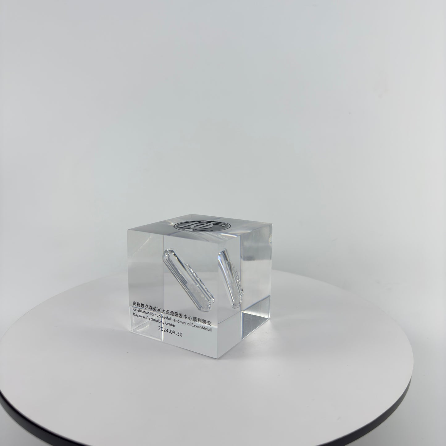 TRANSPARENT PAPER WEIGHT ENCAPSULATED WITH GLASS TUBE
