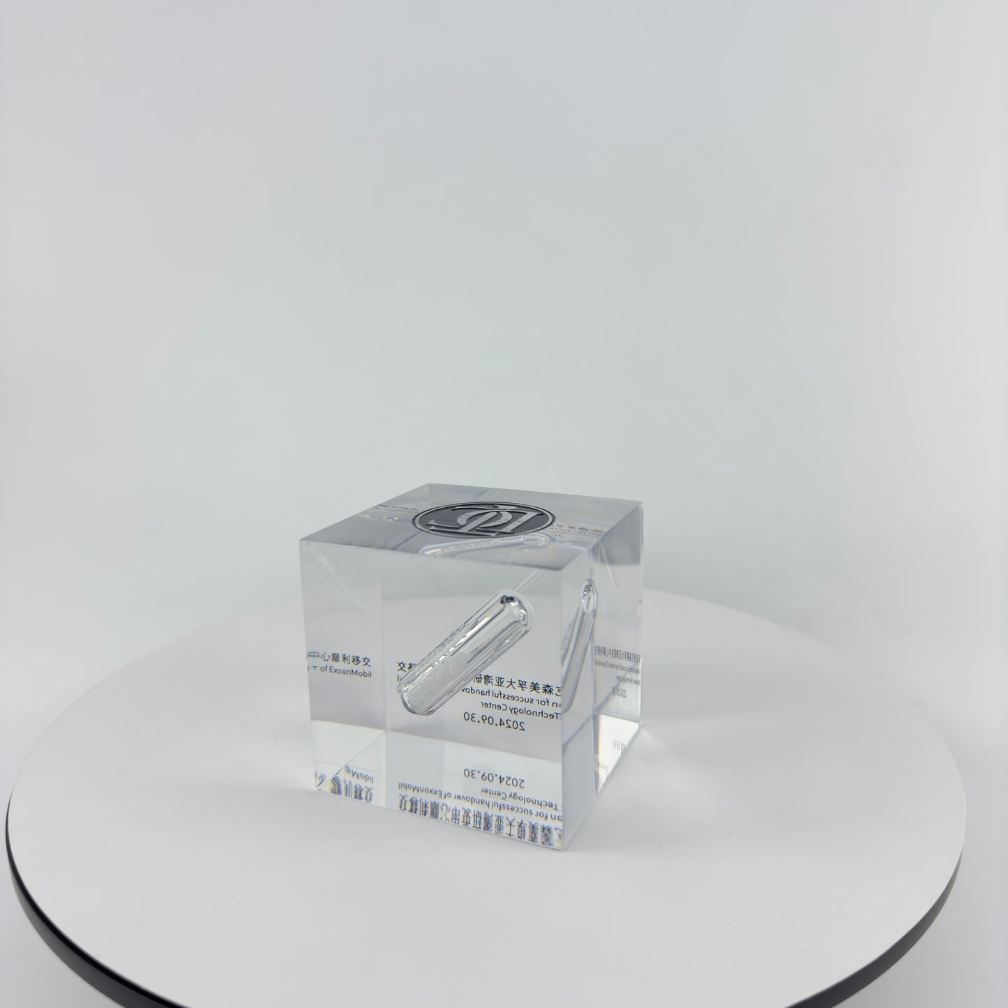 TRANSPARENT PAPER WEIGHT ENCAPSULATED WITH GLASS TUBE