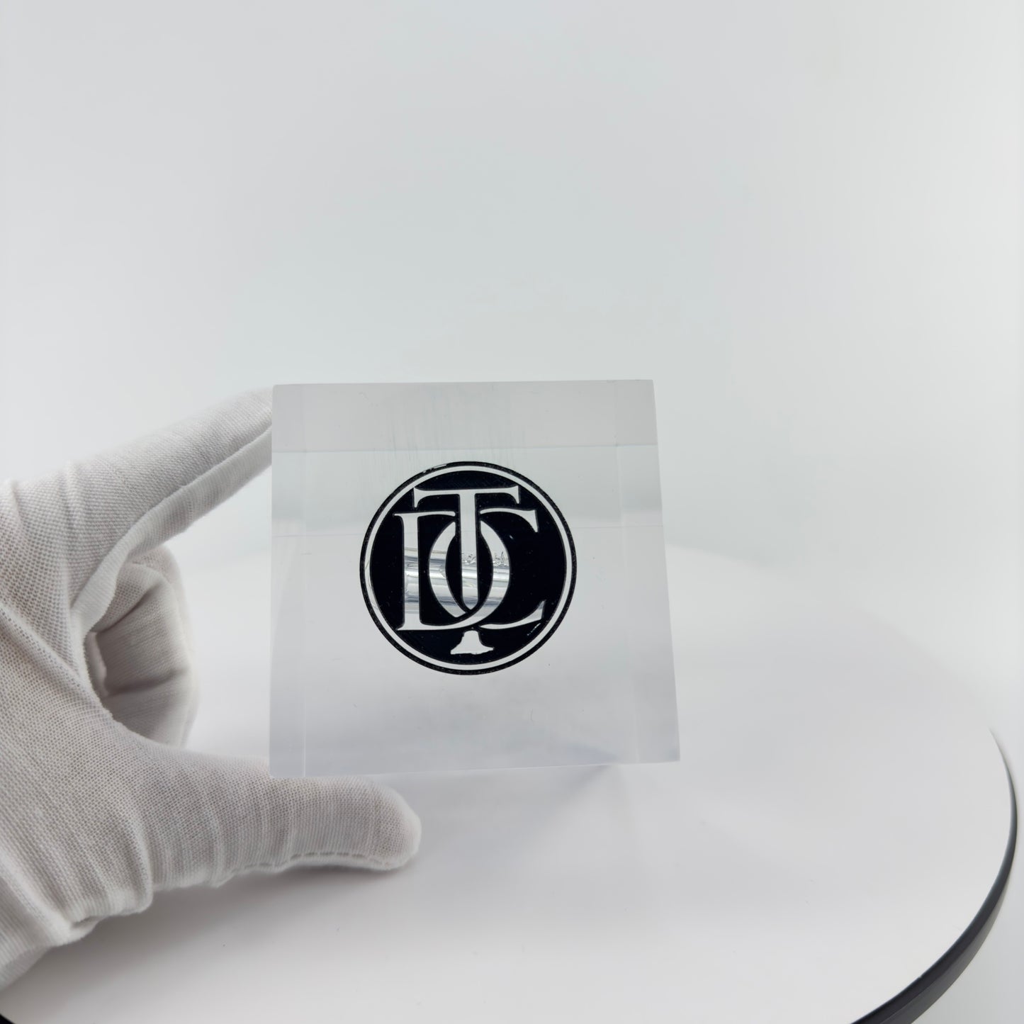 TRANSPARENT PAPER WEIGHT ENCAPSULATED WITH GLASS TUBE