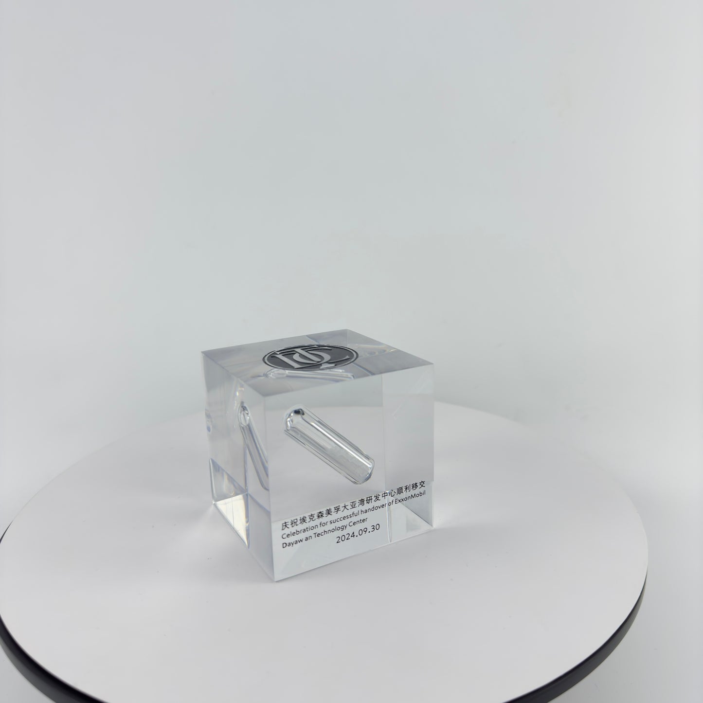 TRANSPARENT PAPER WEIGHT ENCAPSULATED WITH GLASS TUBE