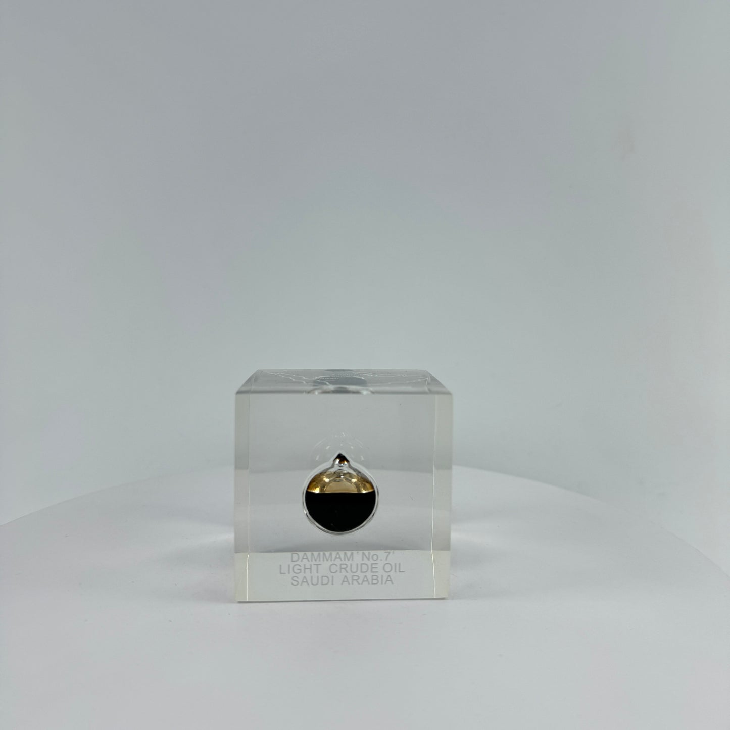 TRANSPARENT PAPER WEIGHT ENCAPSULATED WITH TEAR DROP OIL BOTTLE