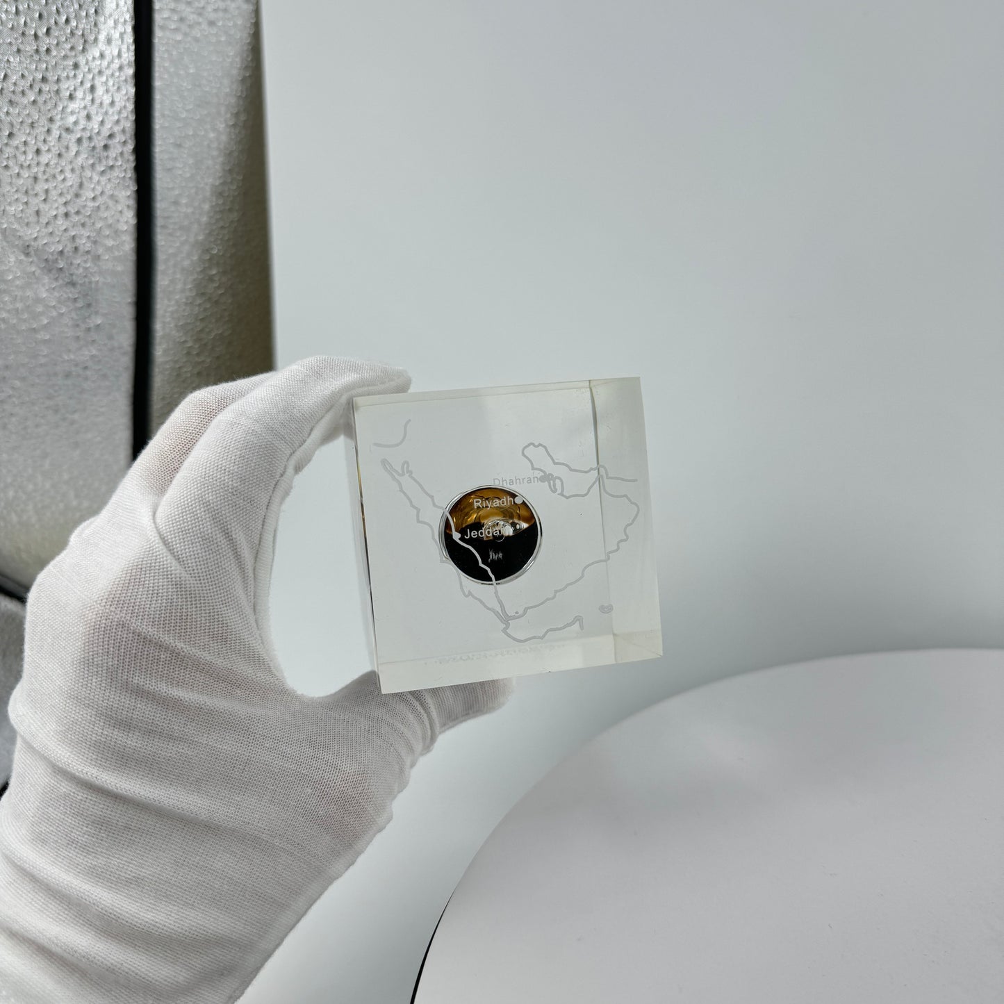 TRANSPARENT PAPER WEIGHT ENCAPSULATED WITH TEAR DROP OIL BOTTLE