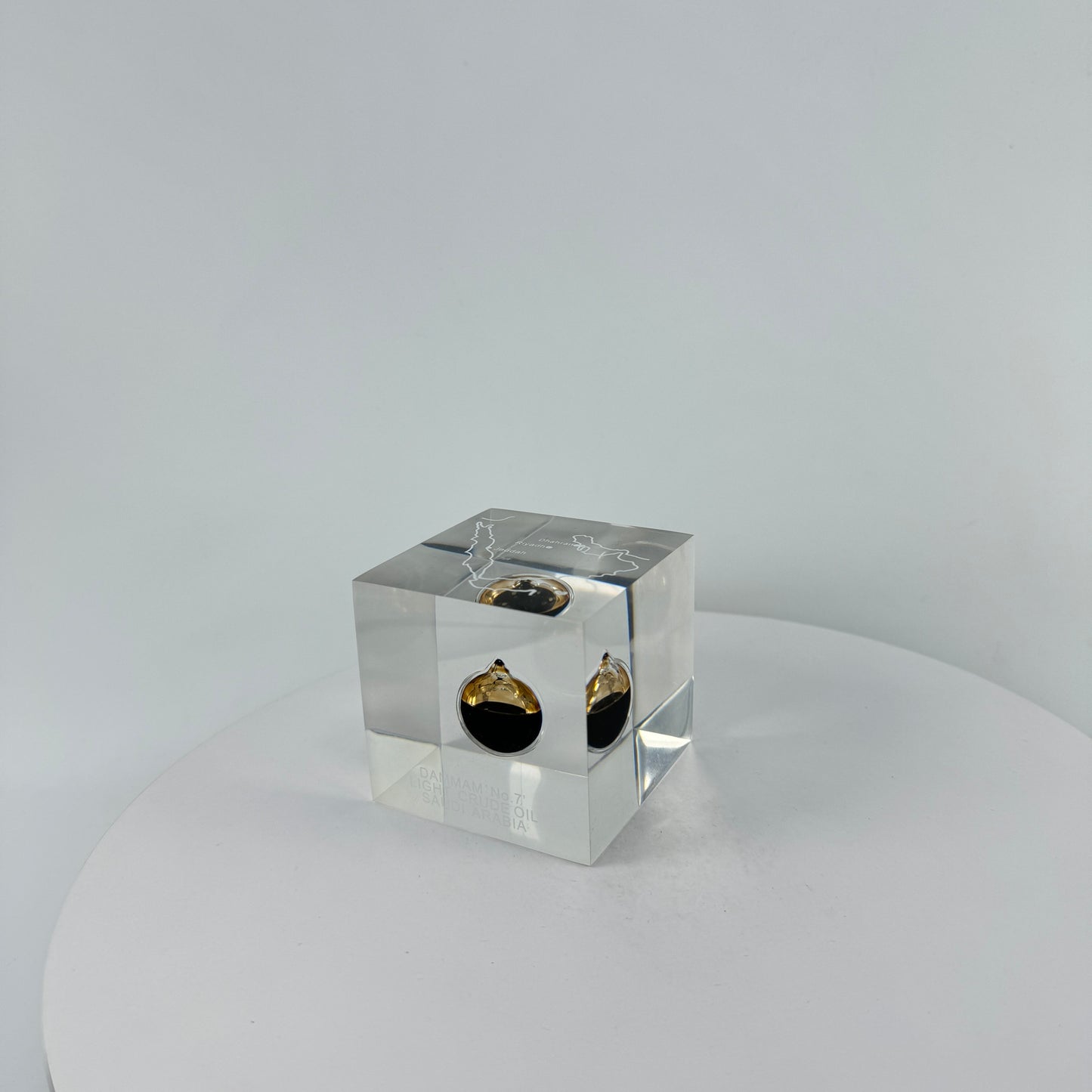 TRANSPARENT PAPER WEIGHT ENCAPSULATED WITH TEAR DROP OIL BOTTLE