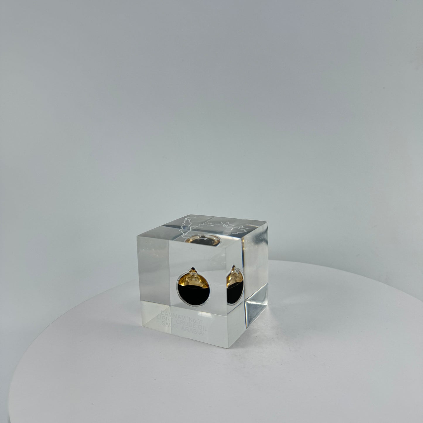 TRANSPARENT PAPER WEIGHT ENCAPSULATED WITH TEAR DROP OIL BOTTLE