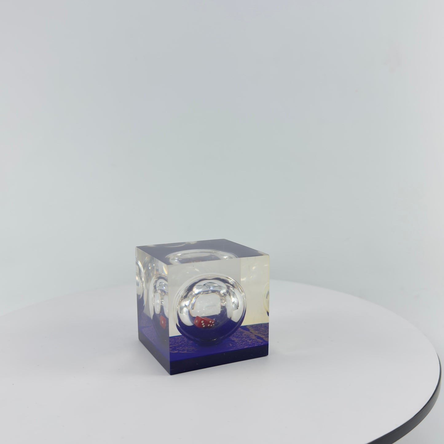 TRANSPARENT PAPER WEIGHT ENCAPSULATED WITH GLASS BOTTLE WITH DICE INSIDE