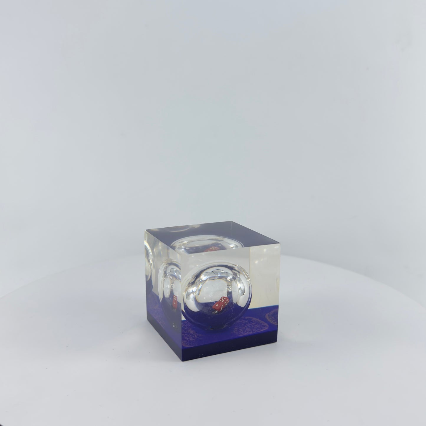 TRANSPARENT PAPER WEIGHT ENCAPSULATED WITH GLASS BOTTLE WITH DICE INSIDE
