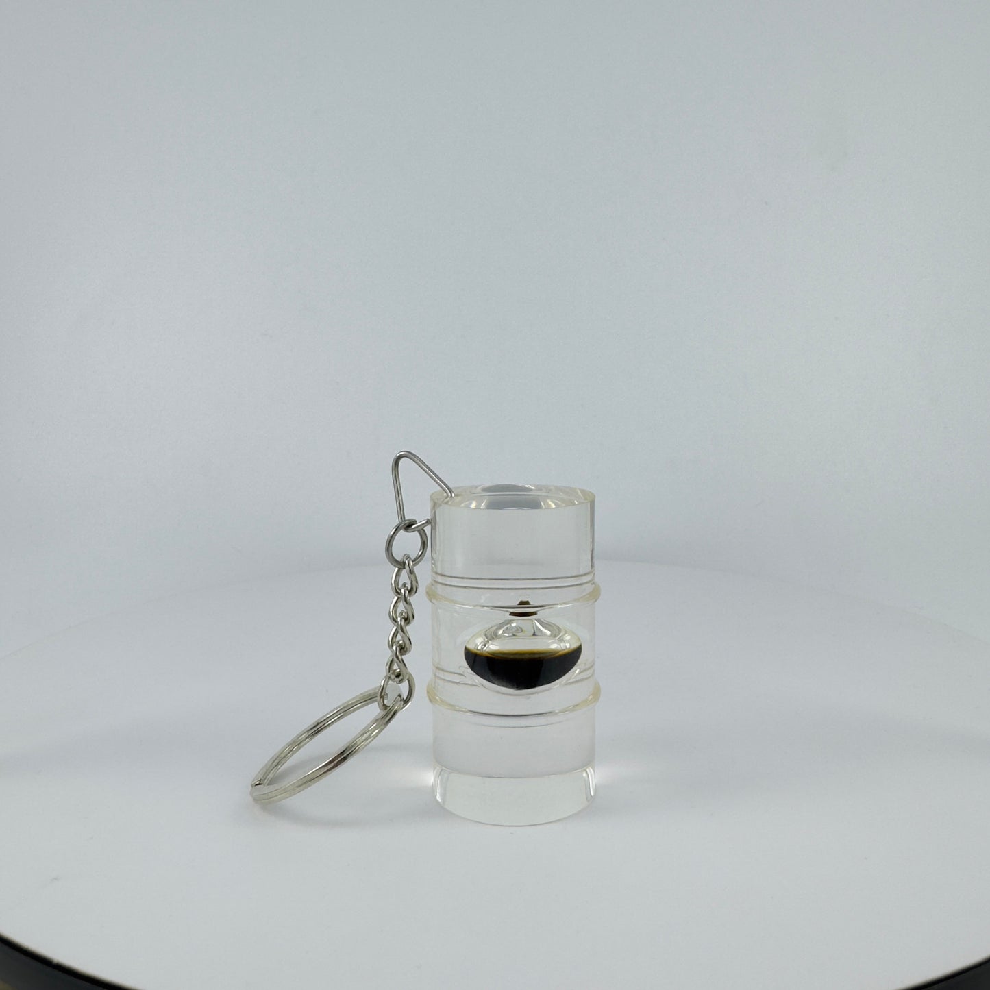 TRANSPARENT KEY CHAIN  ENCAPSULATED WITH TEAR DROP OIL BOTTLE