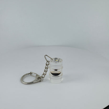 TRANSPARENT KEY CHAIN  ENCAPSULATED WITH TEAR DROP OIL BOTTLE