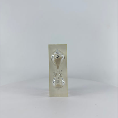 SMALL SAND TIMER ENCAPSULATED INTO TRANSPARENT RESIN