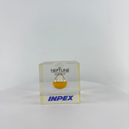 TRANSPARENT PAPER WEIGHT ENCAPSULATED WITH TEAR DROP OIL BOTTLE
