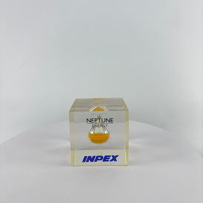 TRANSPARENT PAPER WEIGHT ENCAPSULATED WITH TEAR DROP OIL BOTTLE